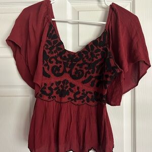 Embroidered flutter sleeve top